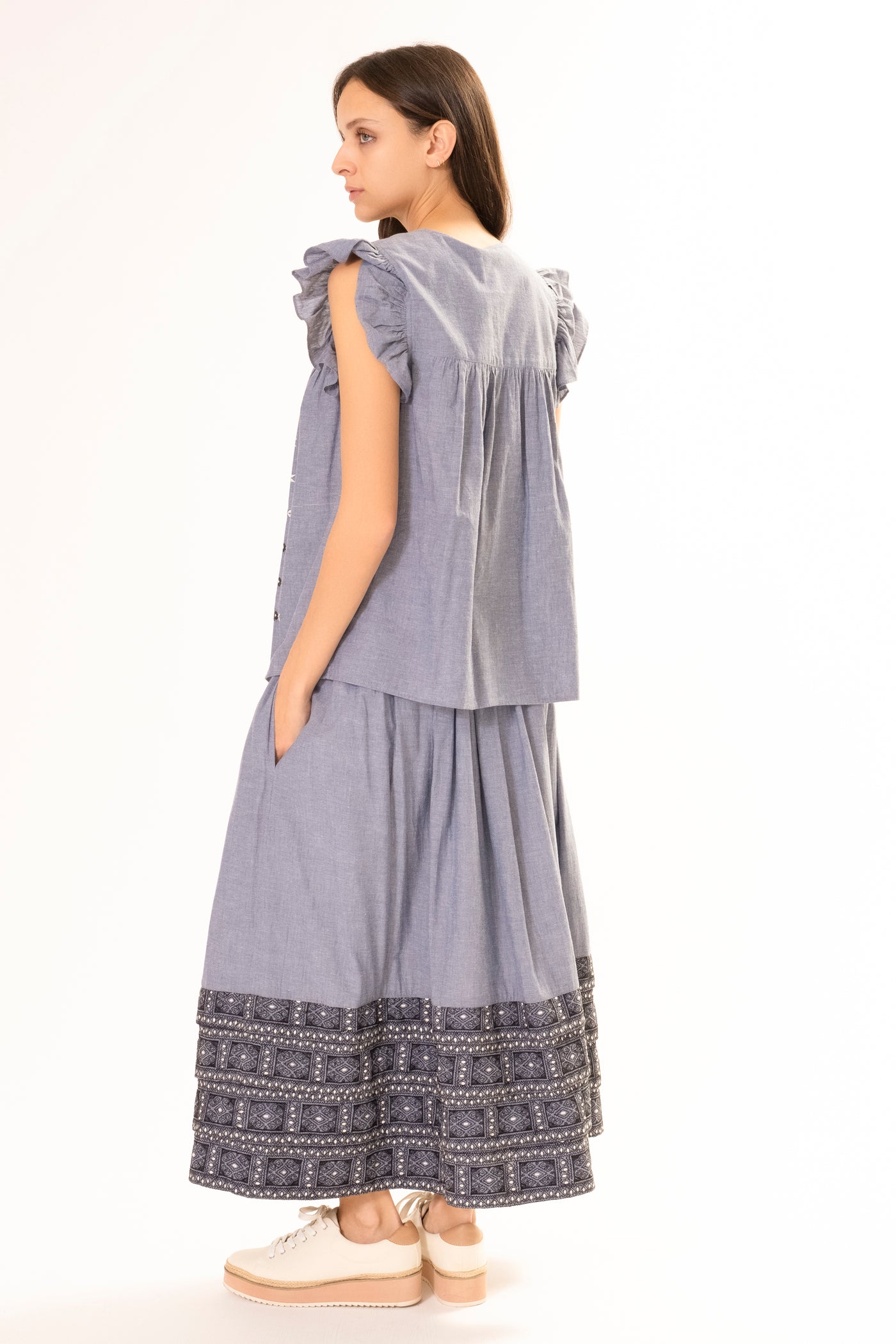 CHAMBRAY EMBROIDERED RUFFLE TOP